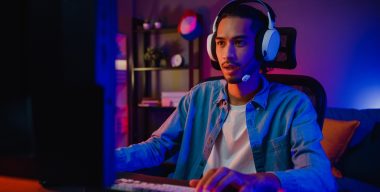 Happy,Asia,Guy,Gamer,Wear,Headphone,Participation,Play,Video,Game